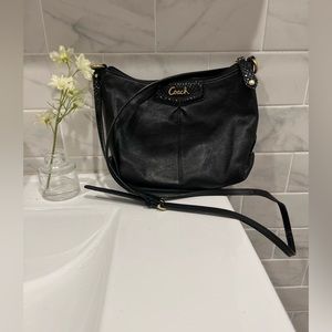 Black coach crossbody bag with gold accents